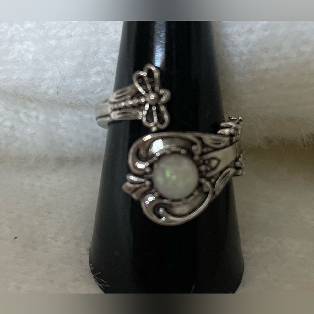 Sterling silver spoon ring with man made opal stone.